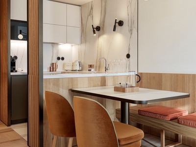  Dining area and kitchen in One-bedroom Suite with Terrace in The Julius Prague